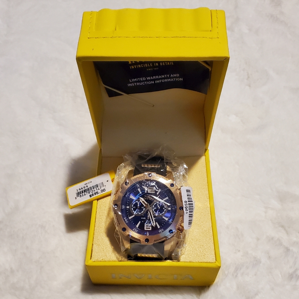** SOLD **Invicta Navy and Gold Men's Watch